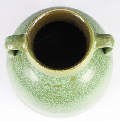 Lot 35 - C.H. Brannam - an Art Deco monochrome green...