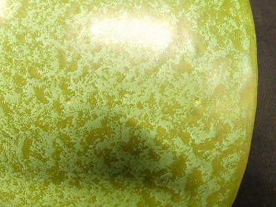 Lot 35 - C.H. Brannam - an Art Deco monochrome green...