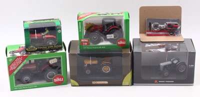 Lot 1822 - Five diecast Massey Ferguson tractors,...