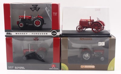 Lot 1823 - Four diecast Massey Ferguson tractors,...