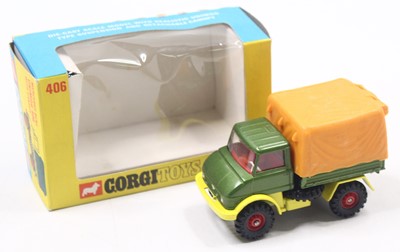 Lot 1444 - A Corgi Toys boxed No. 406 Unimog comprising...