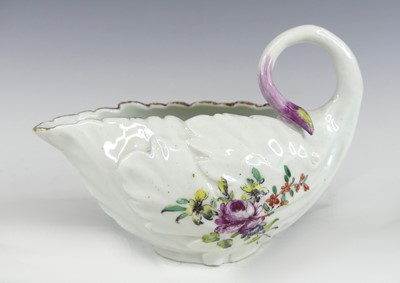 Lot 2059 - An English porcelain Cos Lettuce sauceboat,...