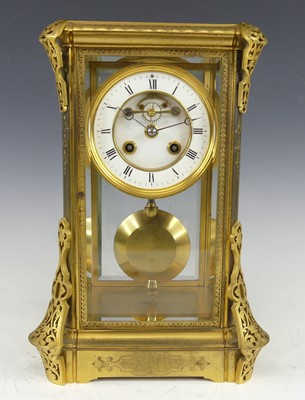 Lot 2501 - A late Victorian gilt brass four-glass mantel...