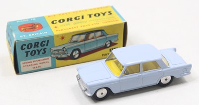 Lot 1104 - Corgi Toys, 217 Fiat 1800 light blue, lemon...