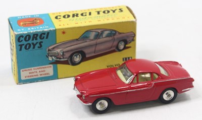 Lot 1108 - Corgi Toys, 228 Volvo P.1800 with red body,...