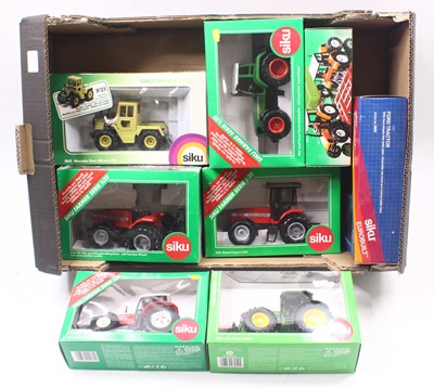 Lot 1835 - Eight various boxed Siku 1/32 scale model...