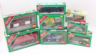 Lot 1836 - Eight various boxed Siku 1/32 scale farming...