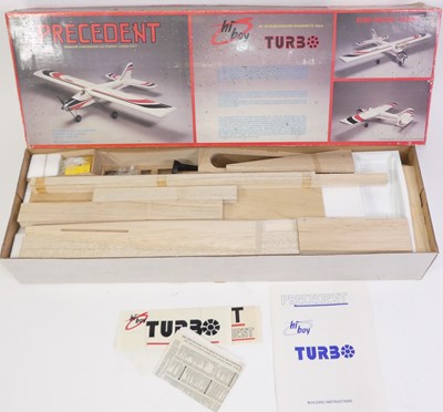 Lot 1690 - A boxed group of two wooden Radio Controlled...