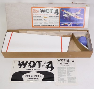 Lot 1696 - A radio-controlled and petrol-driven plastic...
