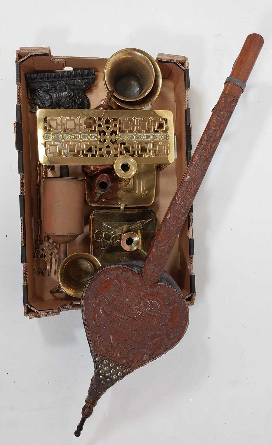 Lot 90 - A box of metalwares to include brass trivet,...