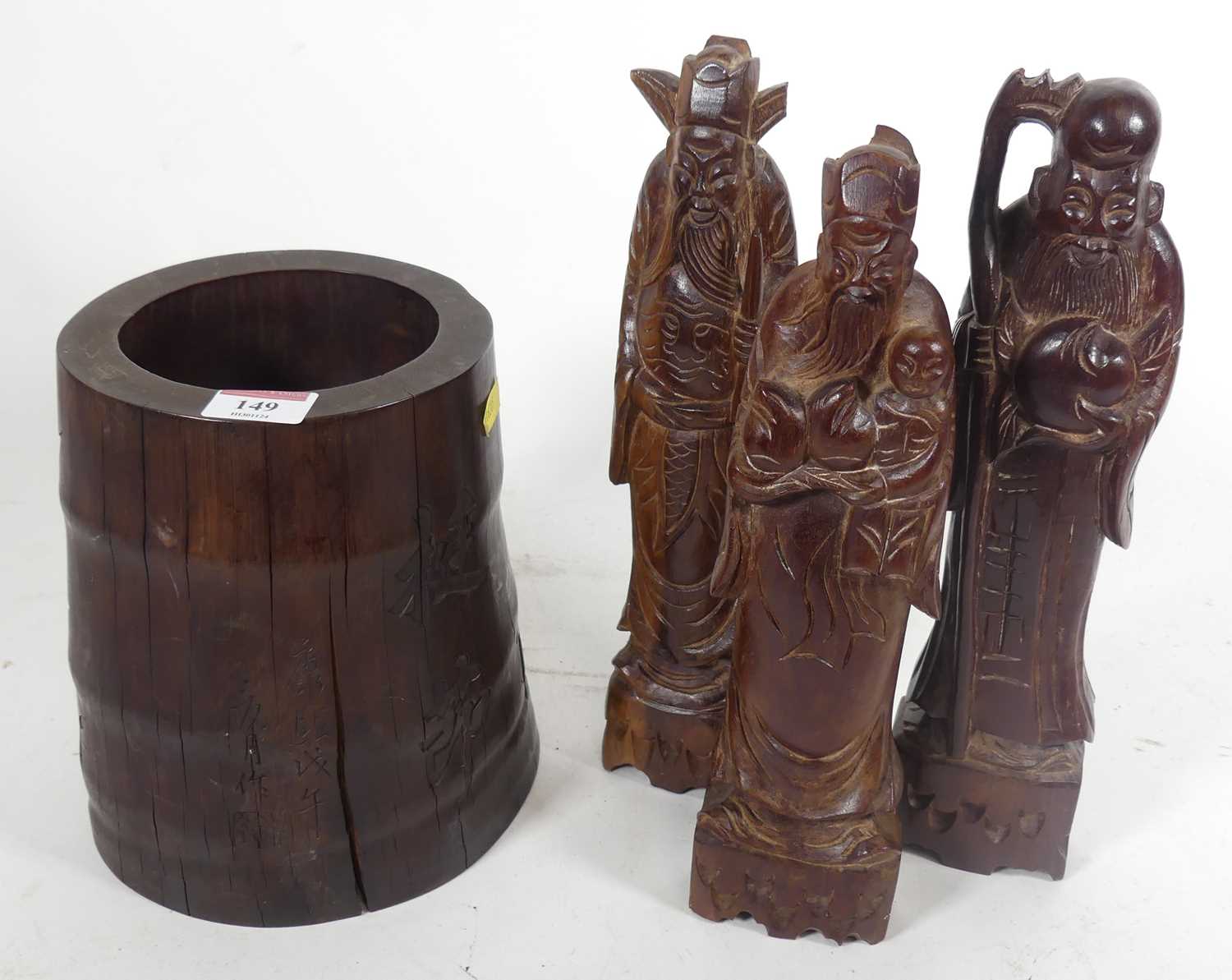 Lot 149 - A collection of carved oriental items to...