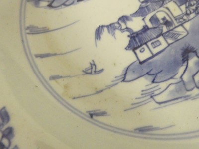 Lot 245 - Two Chinese celadon plates; together with two...