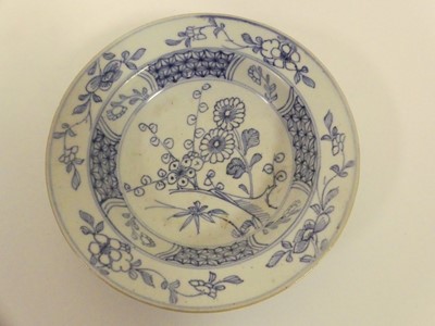 Lot 245 - Two Chinese celadon plates; together with two...