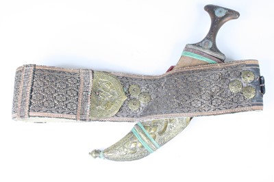 Lot 761 - An early 20th century Omani jambiya, having a...