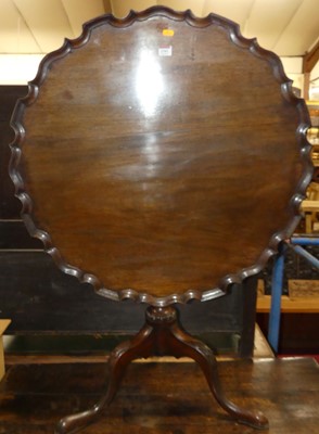 Lot 1341 - A George III mahogany pedestal tripod table...