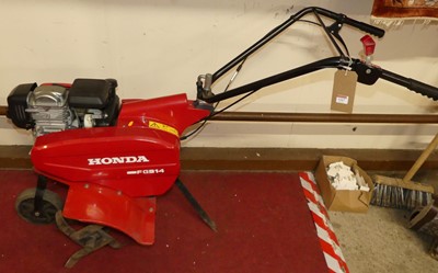 Lot 1167 - A Honda FG314 petrol driven garden rotavator