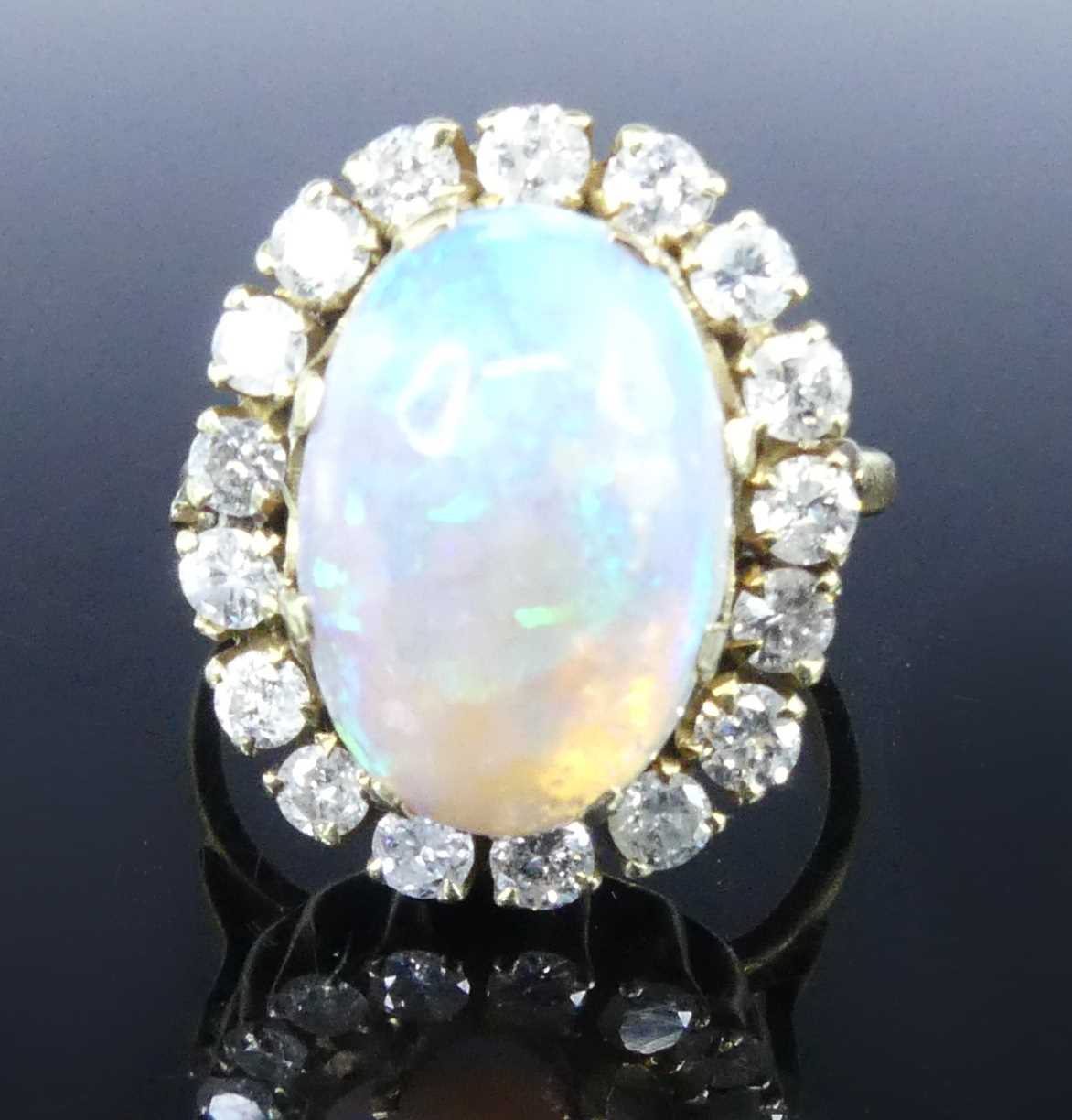Lot 2501 - An 18ct yellow and white gold, opal and...