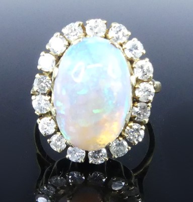 Lot 2501 - An 18ct yellow and white gold, opal and...
