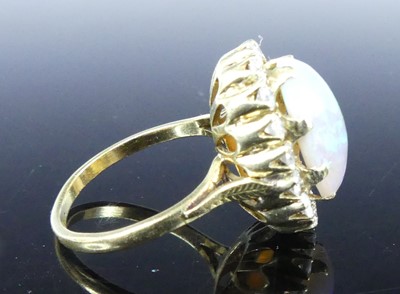 Lot 2501 - An 18ct yellow and white gold, opal and...