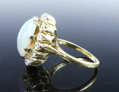 Lot 2501 - An 18ct yellow and white gold, opal and...
