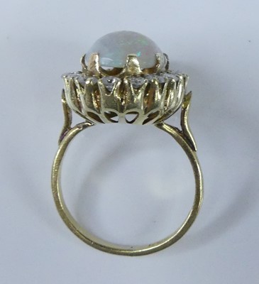 Lot 2501 - An 18ct yellow and white gold, opal and...
