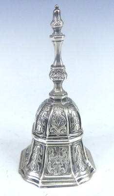 Lot 1139 - A George V silver hand bell, of rounded square...