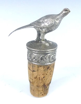 Lot 1140 - A late 19th century white metal novelty bottle...