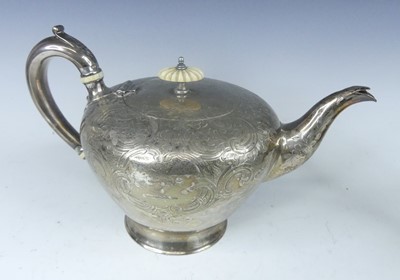Lot 1108 - A Victorian silver teapot, with all-over...