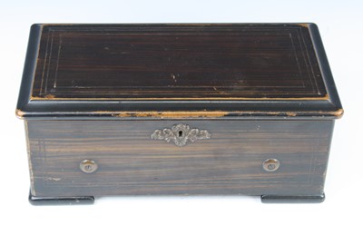 Lot 613 - A late 19th century Swiss music box, the lever...