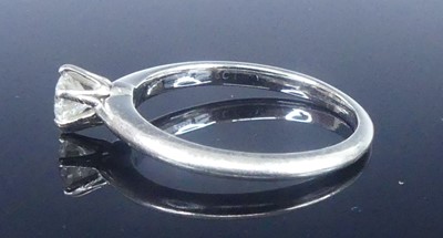 Lot 2565 - A Tiffany platinum diamond solitaire ring,...