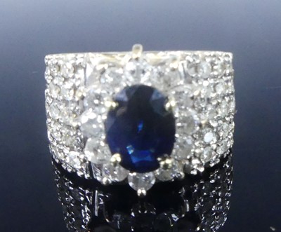 Lot 2621 - A yellow and white metal, sapphire and diamond...