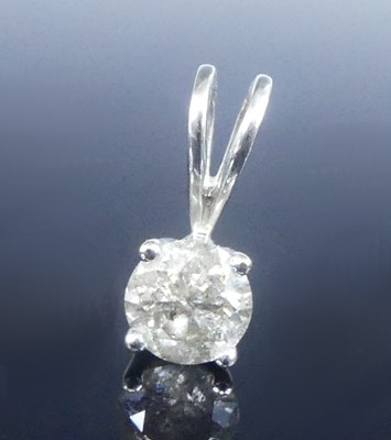 Lot 2622 - An 18ct white gold single stone pendant,...