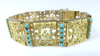 Lot 2575 - A yellow metal rectangular scrollwork panel...
