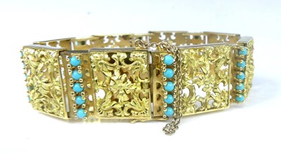 Lot 2575 - A yellow metal rectangular scrollwork panel...