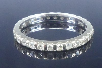 Lot 2625 - A white metal diamond eternity ring,...