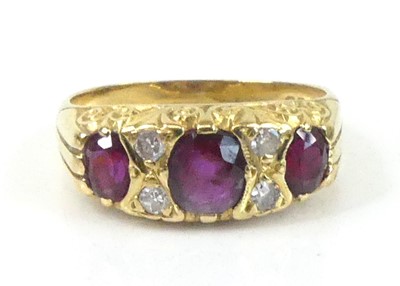 Lot 2584 - An 18ct yellow gold, ruby and diamond half...