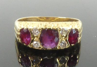 Lot 2584 - An 18ct yellow gold, ruby and diamond half...