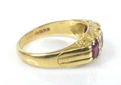 Lot 2584 - An 18ct yellow gold, ruby and diamond half...