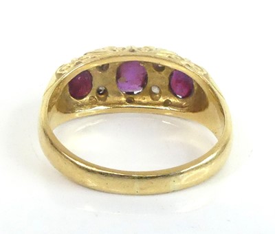 Lot 2584 - An 18ct yellow gold, ruby and diamond half...