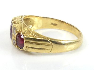 Lot 2584 - An 18ct yellow gold, ruby and diamond half...