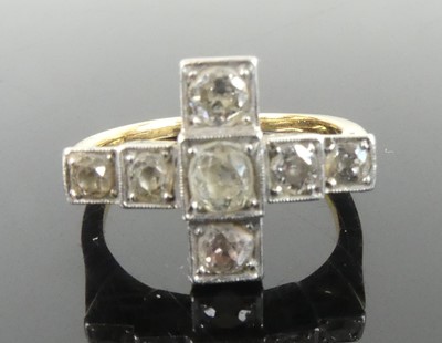 Lot 2629 - A yellow and white metal diamond half eternity...