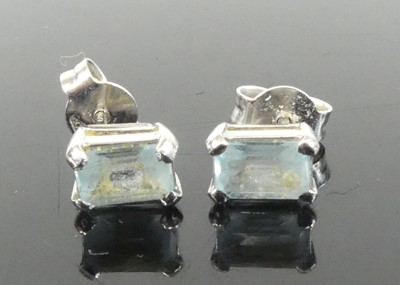 Lot 2647 - A pair of 18ct white gold aquamarine single...