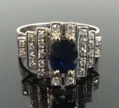 Lot 2648 - A white metal, sapphire and diamond lozenge...