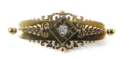 Lot 2693 - A yellow metal diamond bar brooch, comprising...