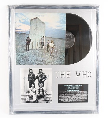 Lot 721 - The Who, a framed presentation to include...