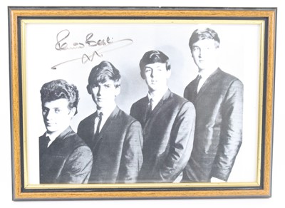 Lot 704 - The Beatles, a 20x25cm black and white...