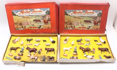 Lot 2062 - Two Crescent Toys Model Farm sets, comprising...