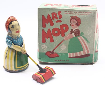 Lot 1945 - Mrs Mop clockwork tinplate toy, housed in its...