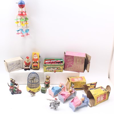 Lot 1954 - A collection of playworn tinplate clockwork...