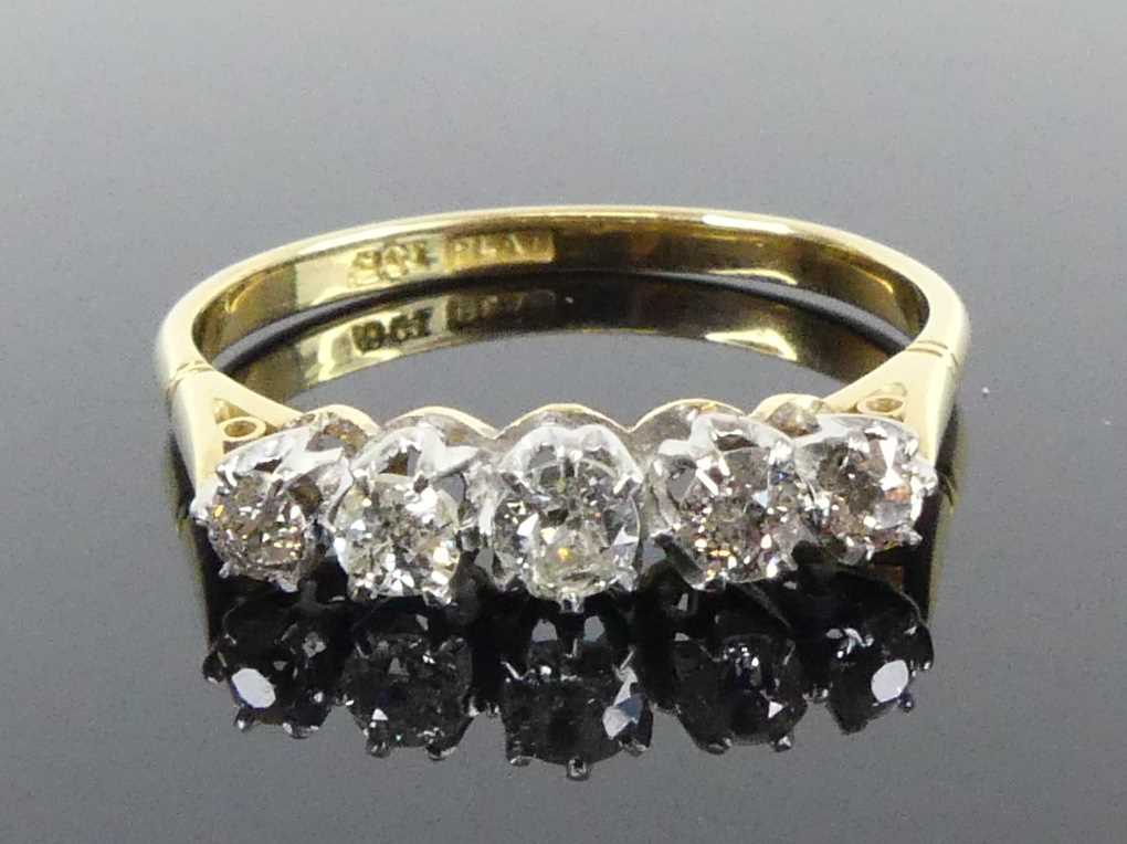 Lot 2504 - A yellow and white metal diamond five-stone...